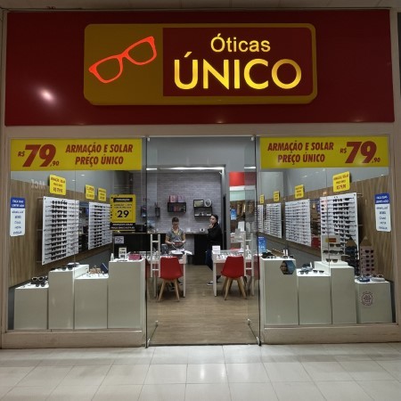 Logo da loja oticas unico
